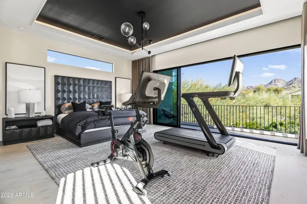 a living room with lots of furniture and a table