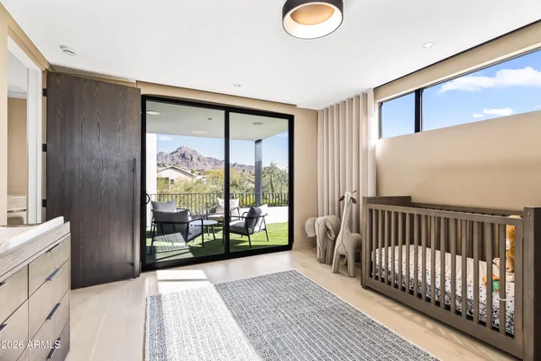 a bathroom with a double vanity sink toilet and shower