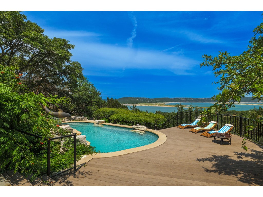 Breathtaking views of Lake Travis from this one-of-a-kind property with outdoor living at its best.