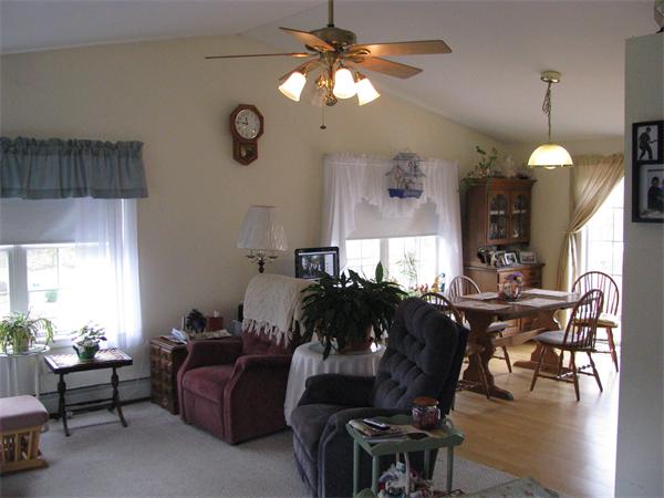 157 Hardwick Road Barre, MA 01005 - Photo 2 of 8 a living room with furniture chandelier and a large window