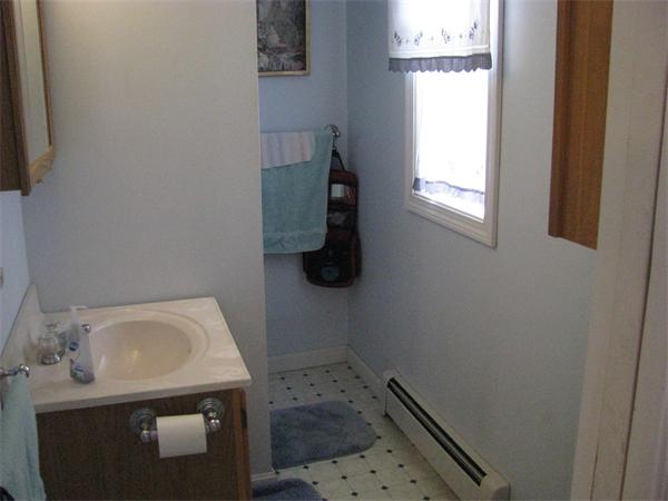157 Hardwick Road Barre, MA 01005 - Photo 6 of 8 a bathroom with a sink toilet and window