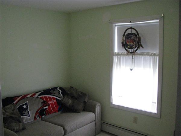 157 Hardwick Road Barre, MA 01005 - Photo 8 of 8 a living room with a couch and a window
