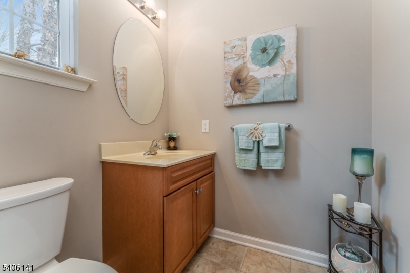 107 Samson Drive Flemington, NJ 08822 - Photo 12 of 29 a bathroom with a toilet sink and mirror