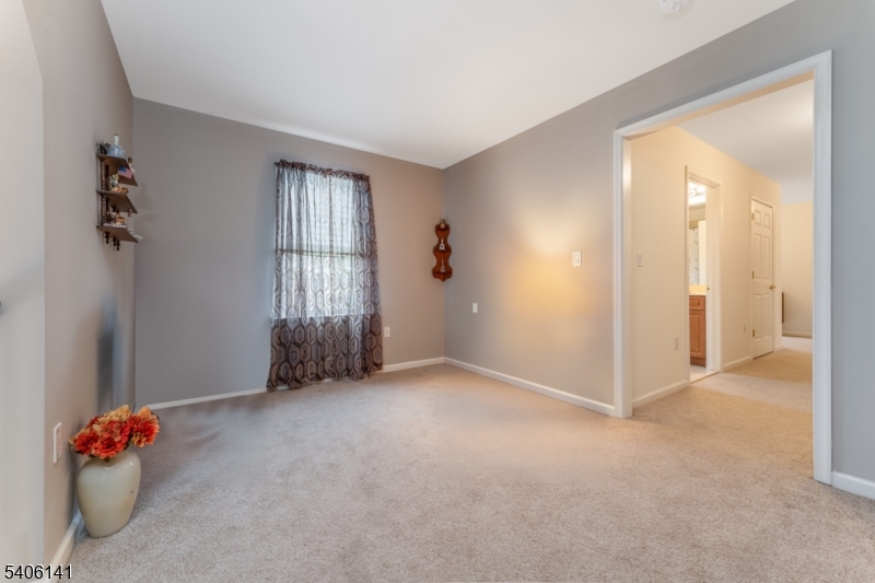 107 Samson Drive Flemington, NJ 08822 - Photo 20 of 29 an empty room with windows and closet
