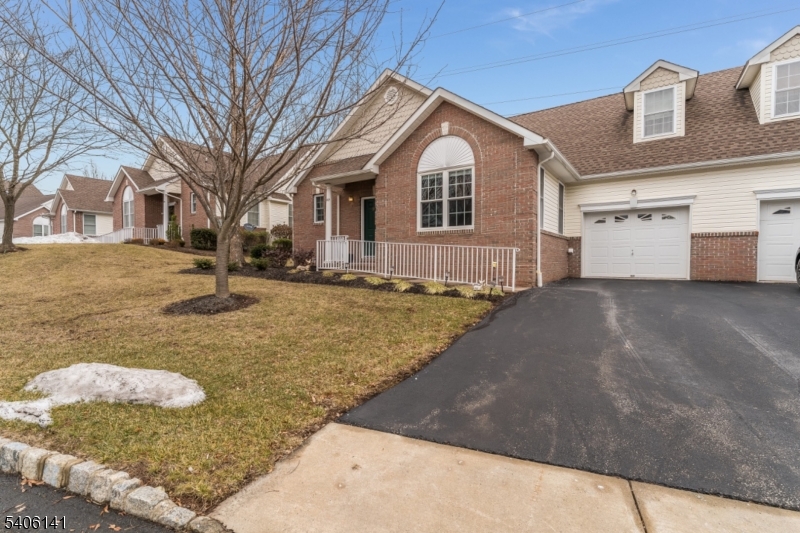 107 Samson Drive Flemington, NJ 08822 - Photo 2 of 29 a view of a white house with a yard
