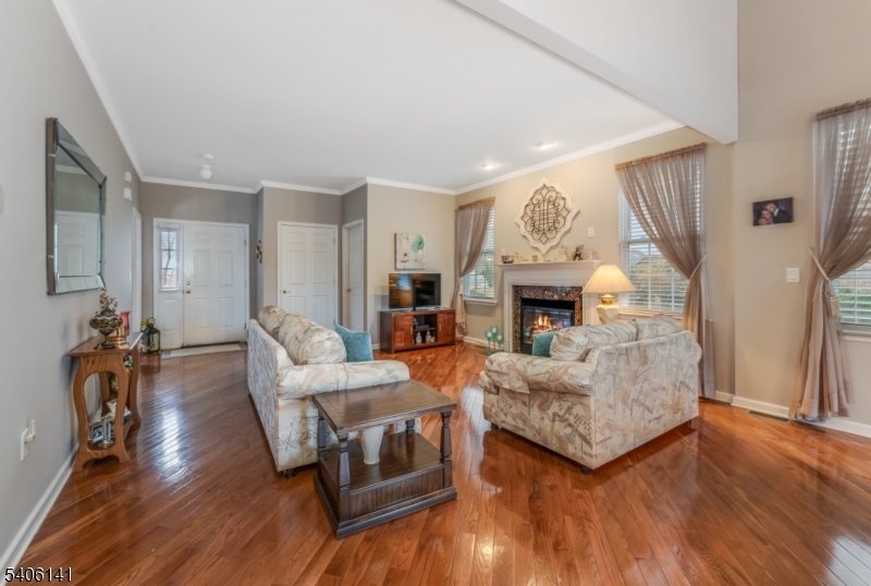 107 Samson Drive Flemington, NJ 08822 - Photo 6 of 29 a living room with furniture and a fireplace