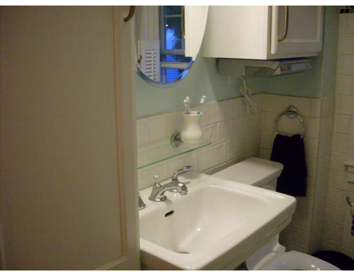 12 Brae Burn Road Milton, MA 02186 - Photo 13 of 18 a bathroom with a sink and a mirror