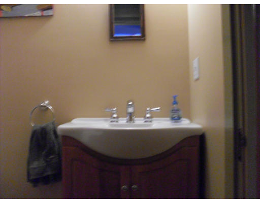 12 Brae Burn Road Milton, MA 02186 - Photo 15 of 18 a bathroom with a sink and a mirror