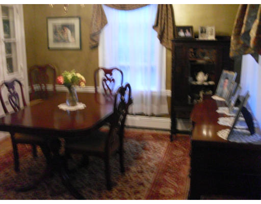12 Brae Burn Road Milton, MA 02186 - Photo 5 of 18 a view of a dining room with furniture and wooden floor