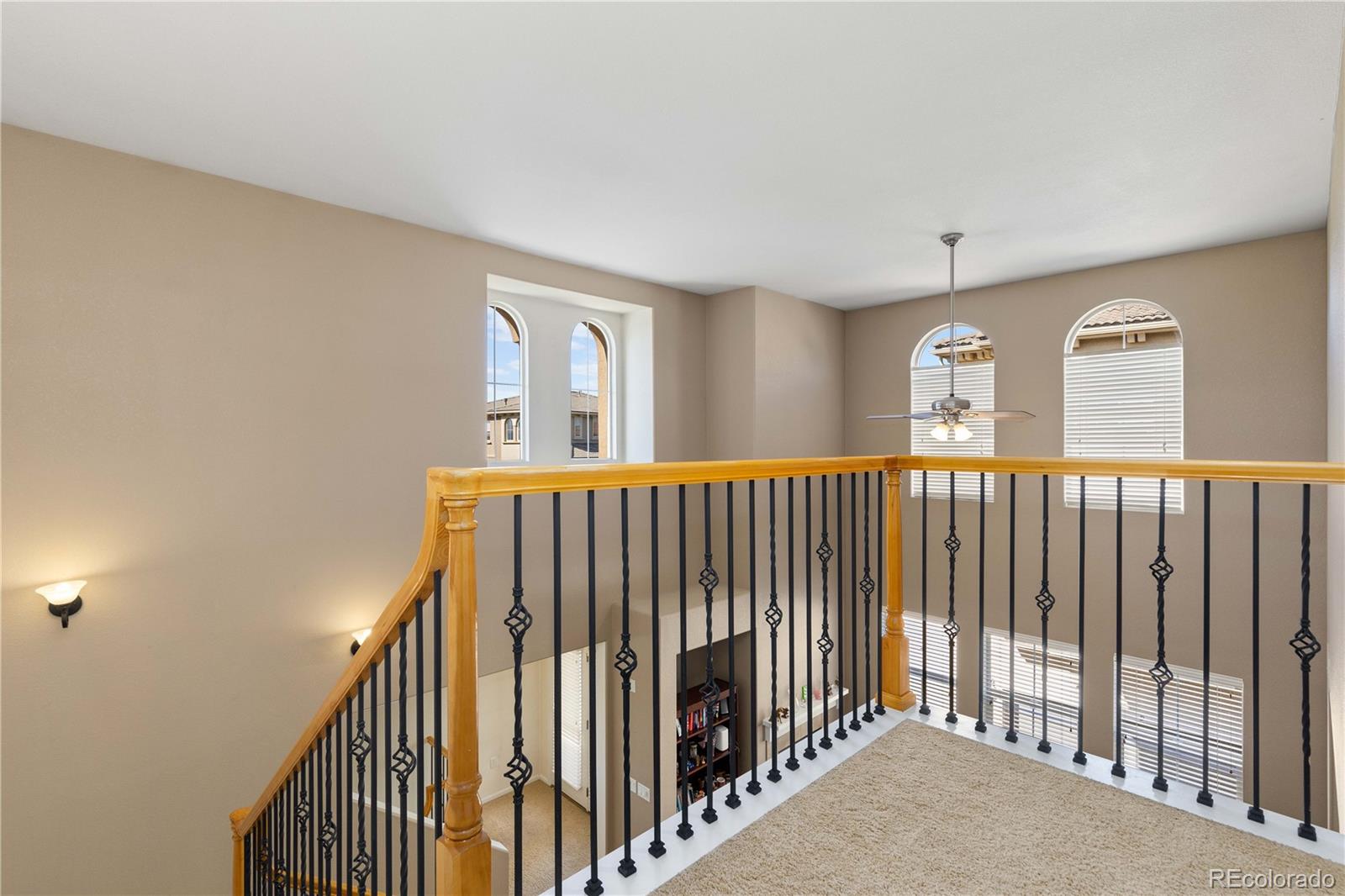 3454 Cascina Place, Unit D Highlands Ranch, CO 80126 - Photo 15 of 31 a view of a hallway with windows