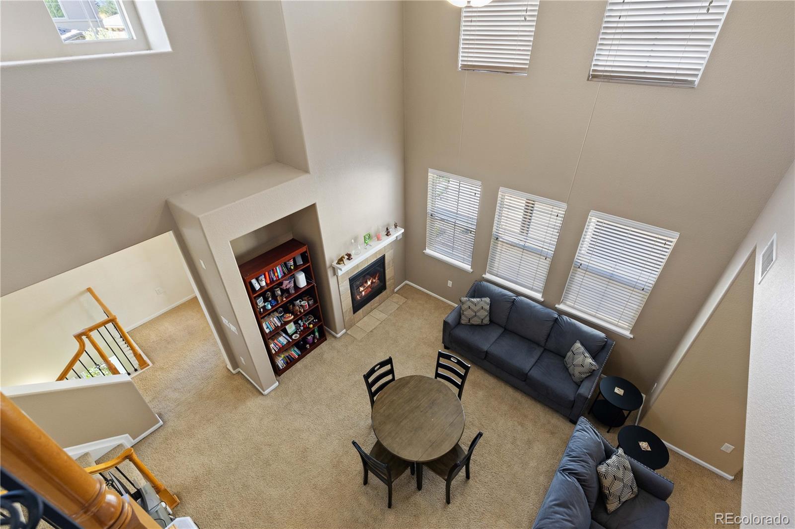 3454 Cascina Place, Unit D Highlands Ranch, CO 80126 - Photo 16 of 31 a living room with furniture and a flat screen tv