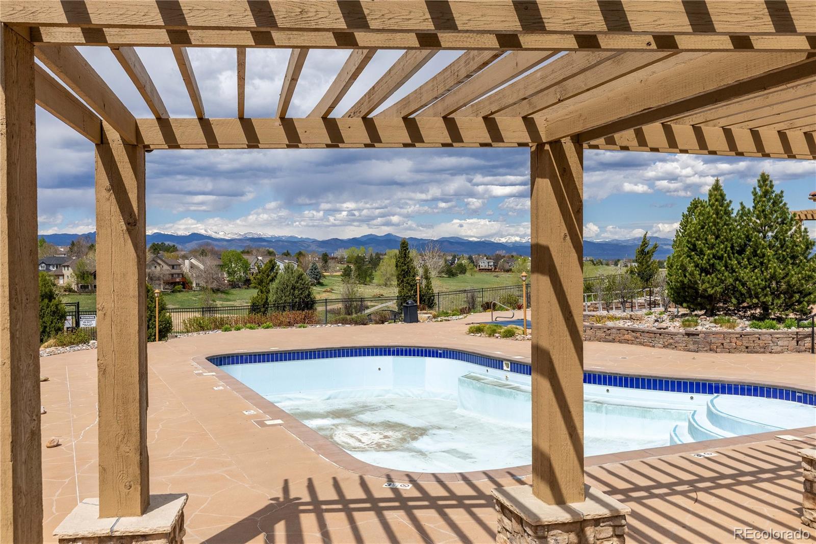 3454 Cascina Place, Unit D Highlands Ranch, CO 80126 - Photo 27 of 31 a view of a swimming pool with a patio