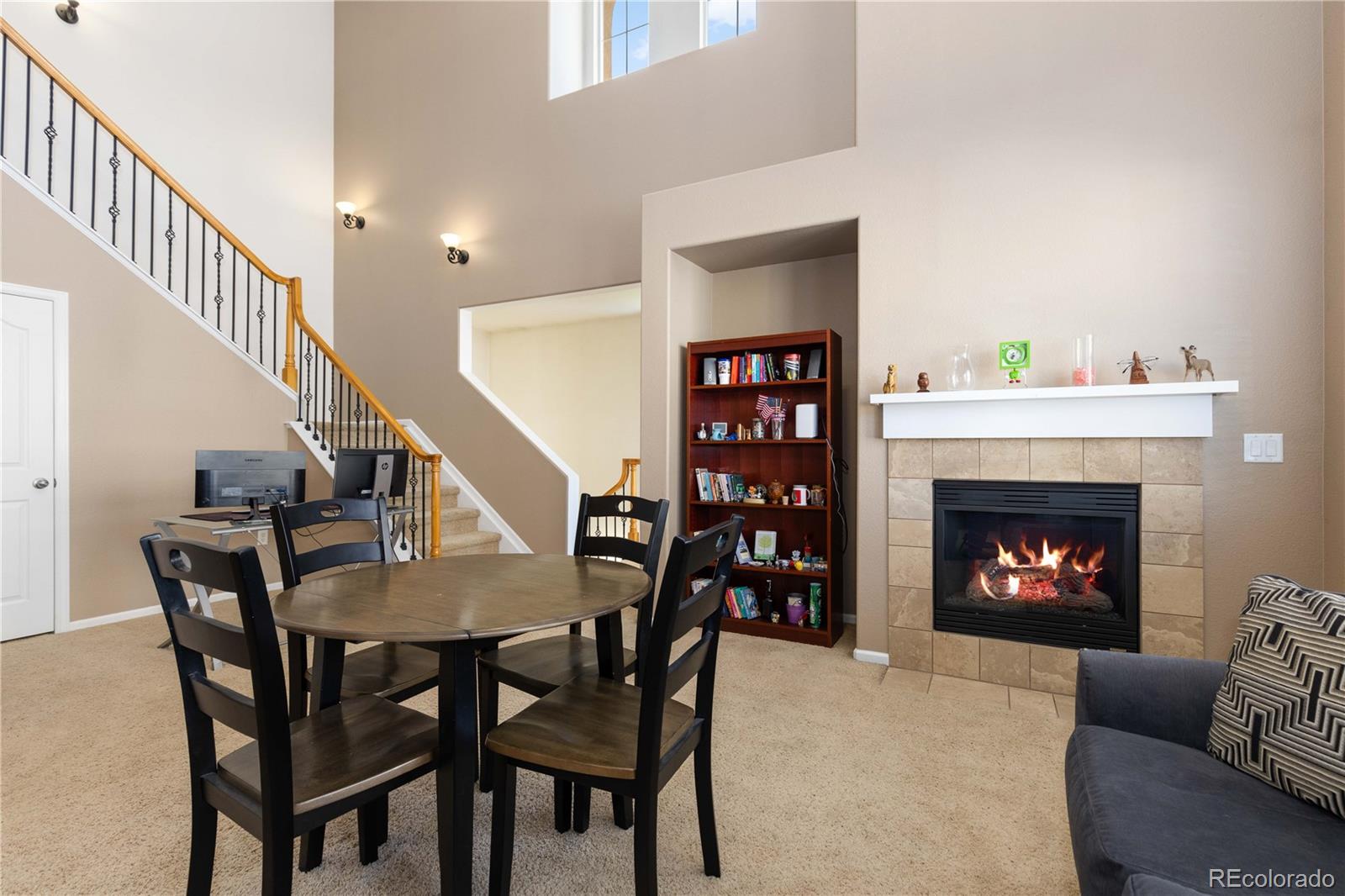 3454 Cascina Place, Unit D Highlands Ranch, CO 80126 - Photo 4 of 31 a view of a livingroom with furniture and a fireplace