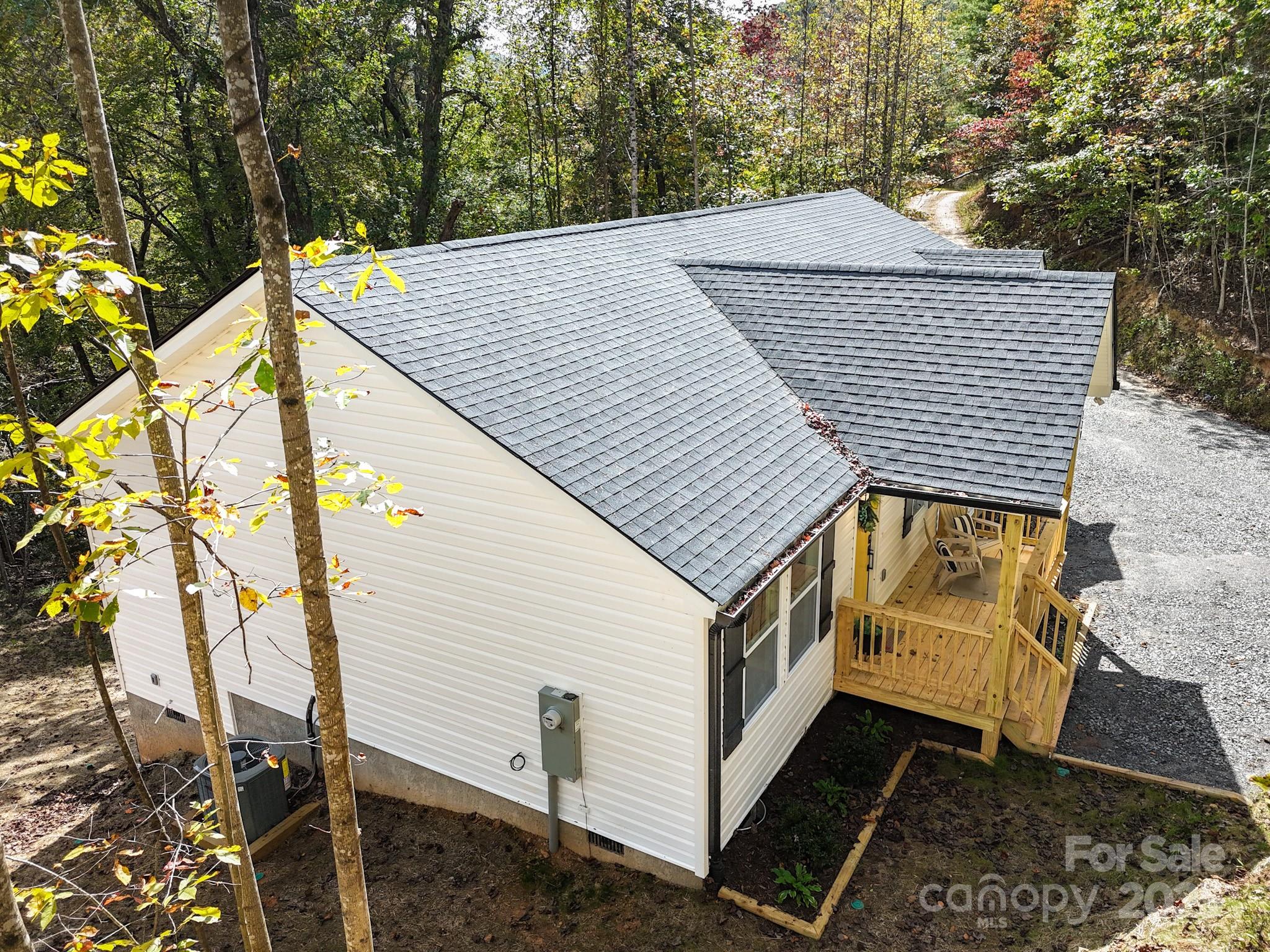 139 Burley Ridge Candler, NC 28715 - Photo 39 of 40 a view of a house with a yard
