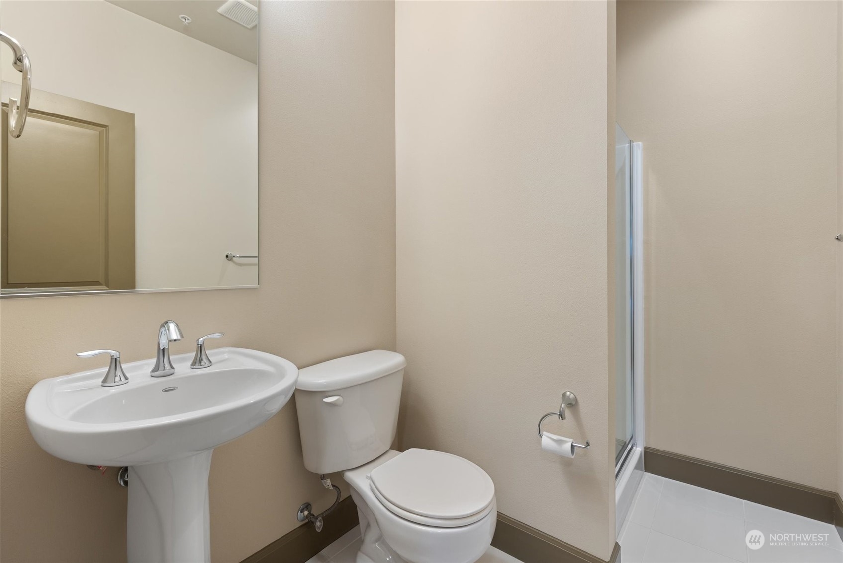 2115 201st Place Southeast, Unit I4 Bothell, WA 98012 - Photo 13 of 24 a bathroom with a sink toilet and a mirror