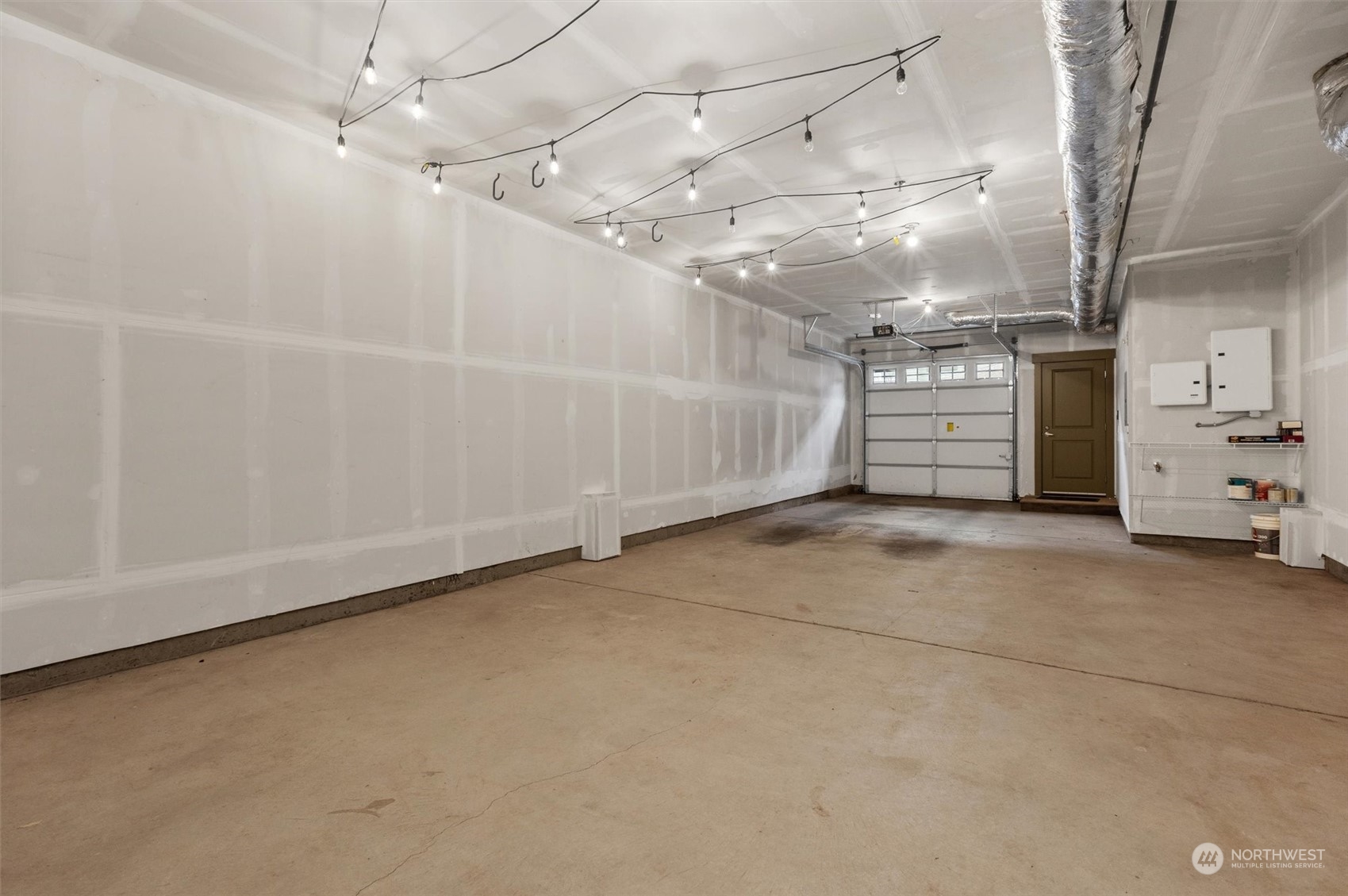 2115 201st Place Southeast, Unit I4 Bothell, WA 98012 - Photo 22 of 24 a view of a garage with furniture