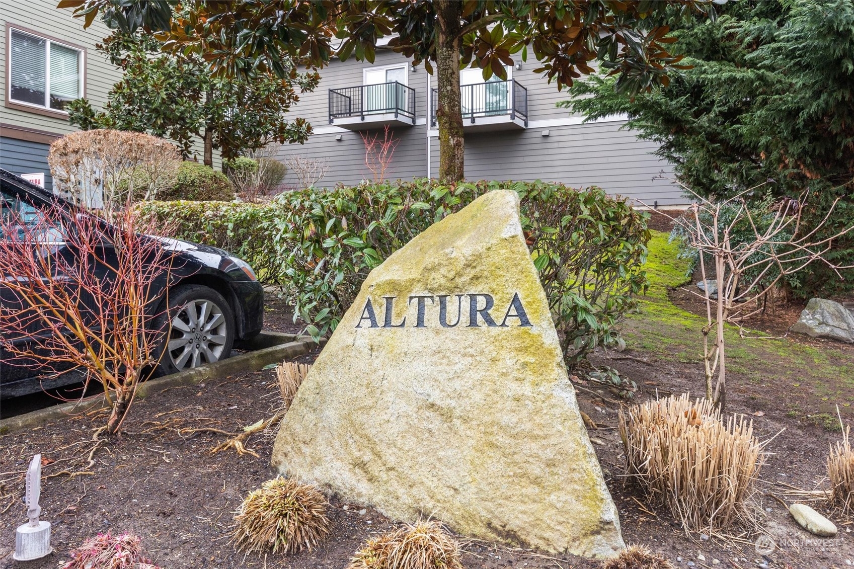 2115 201st Place Southeast, Unit I4 Bothell, WA 98012 - Photo 24 of 24 a view of a yard with plants and trees