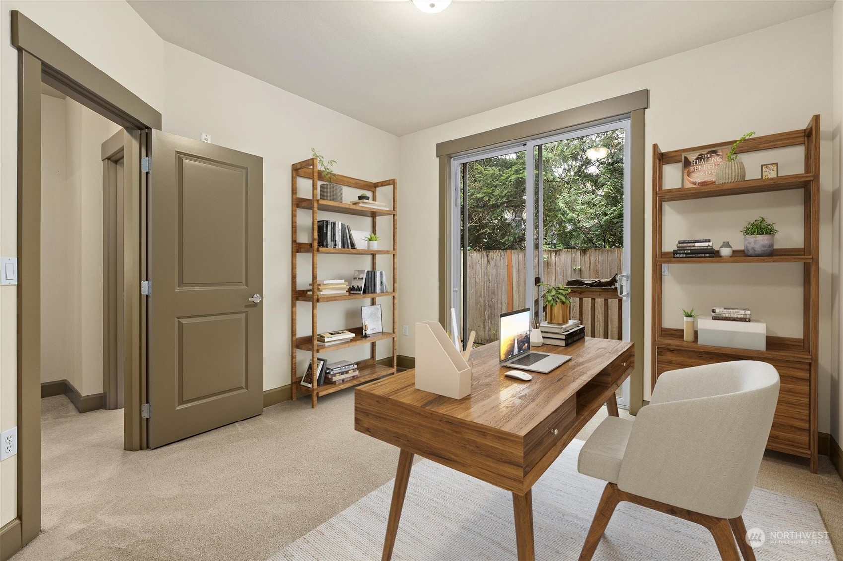 2115 201st Place Southeast, Unit I4 Bothell, WA 98012 - Photo 10 of 24 a view of a workspace with furniture and a window