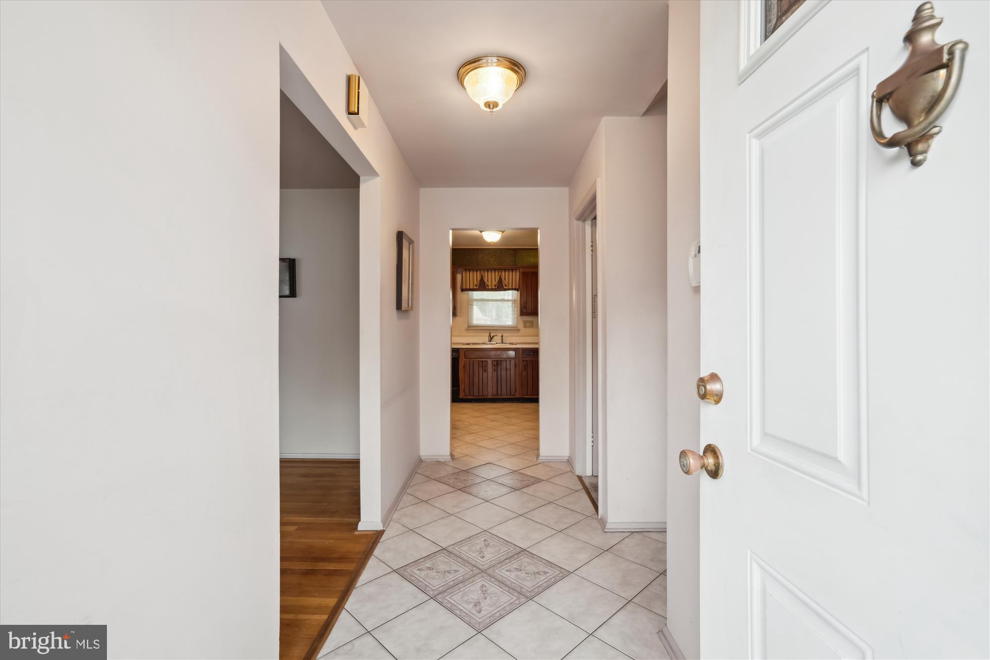 12103 Chesterton Drive Upper Marlboro, MD 20774 - Photo 14 of 30 a view of a hallway to rooms and stairs