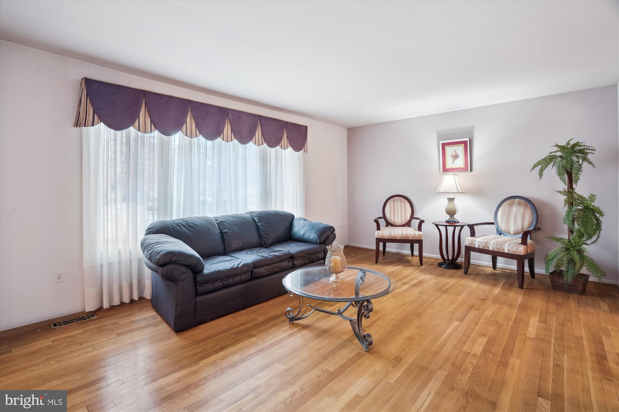 12103 Chesterton Drive Upper Marlboro, MD 20774 - Photo 23 of 30 a living room with furniture and a wooden floor