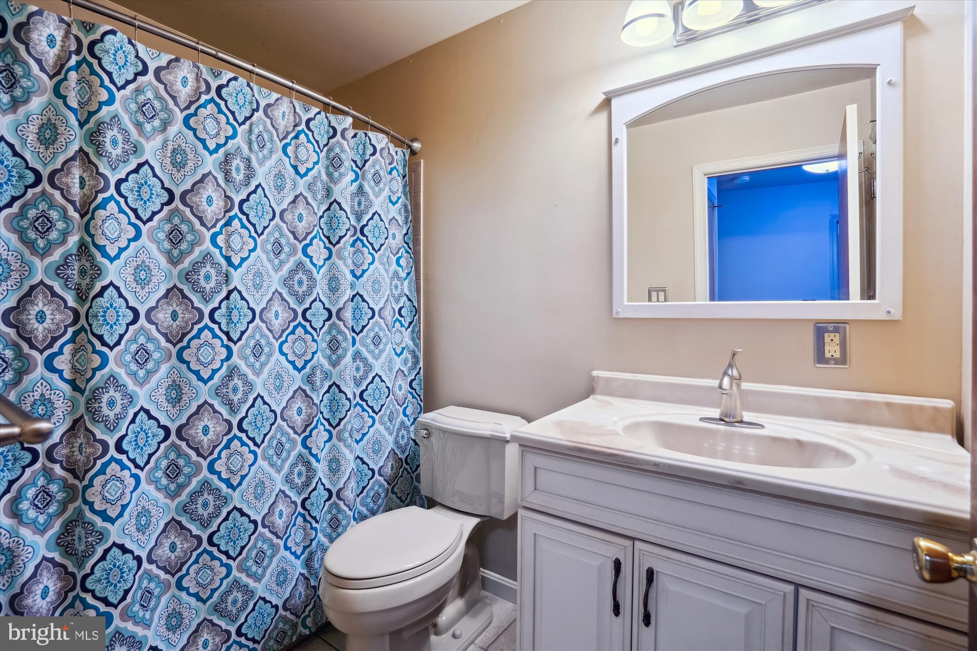 12103 Chesterton Drive Upper Marlboro, MD 20774 - Photo 6 of 30 a bathroom with a sink a toilet and a mirror