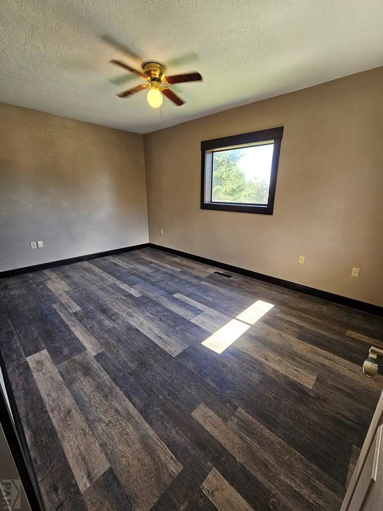 401 Park Street Springfield, CO 81073 - Photo 15 of 50 wooden floor in an empty room