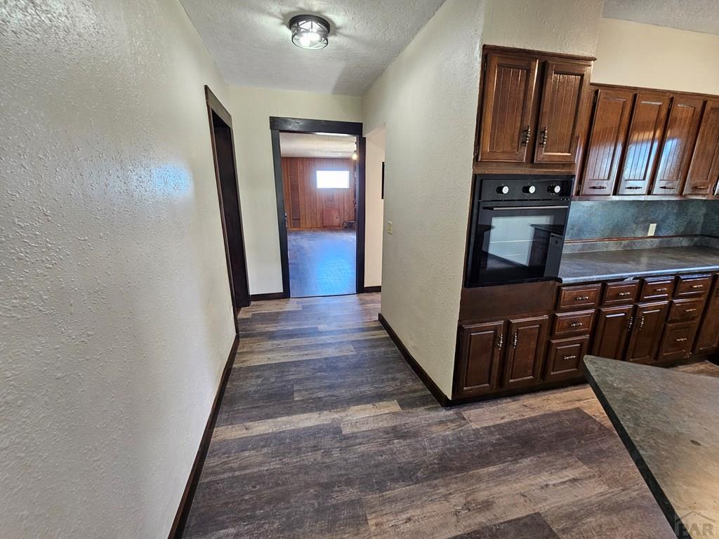 401 Park Street Springfield, CO 81073 - Photo 23 of 50 a view of a kitchen from the hallway