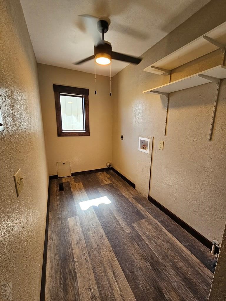 401 Park Street Springfield, CO 81073 - Photo 24 of 50 a view of an empty room with wooden floor and a window