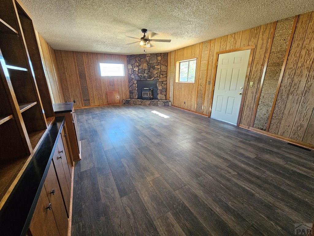 401 Park Street Springfield, CO 81073 - Photo 25 of 50 a view of an empty room with wooden floor and a window
