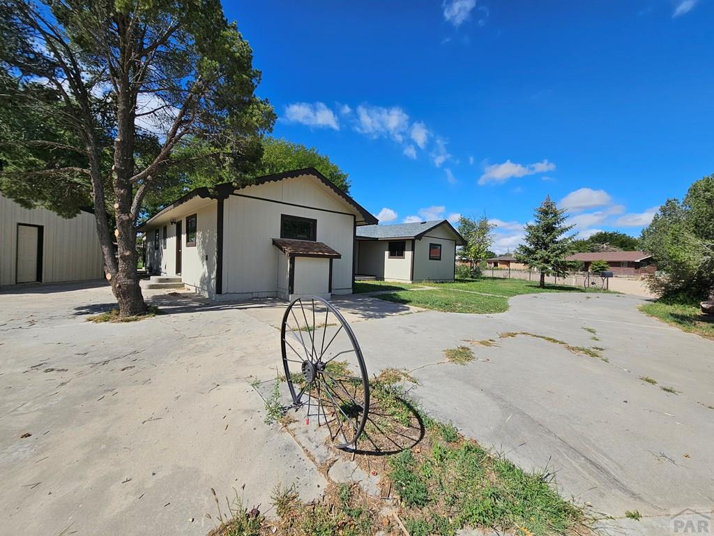 401 Park Street Springfield, CO 81073 - Photo 36 of 50 a view of a house with a yard