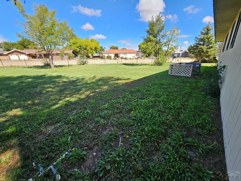 401 Park Street Springfield, CO 81073 - Photo 41 of 50 a view of a green field with lots of bushes