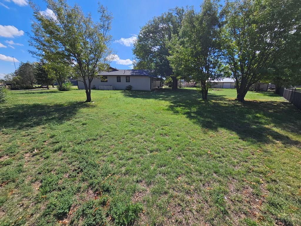 401 Park Street Springfield, CO 81073 - Photo 45 of 50 a front view of a house with a yard