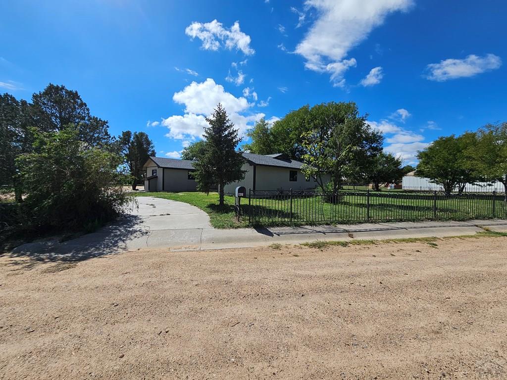 401 Park Street Springfield, CO 81073 - Photo 46 of 50 a view of a house with a backyard