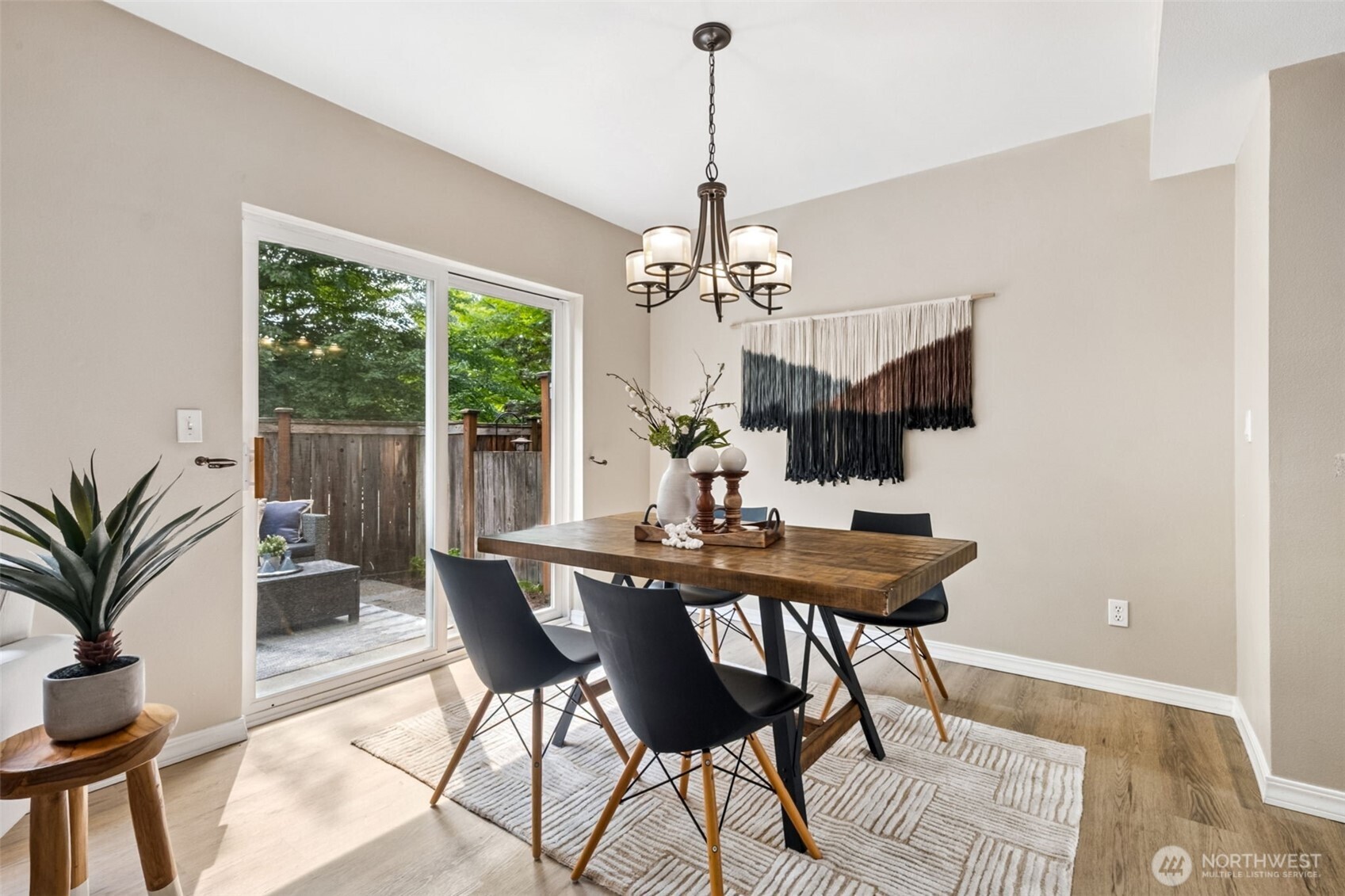 4808 Northeast Sunset Boulevard, Unit A102 Renton, WA 98059 - Photo 13 of 30 a view of a dining room with furniture window and outside view