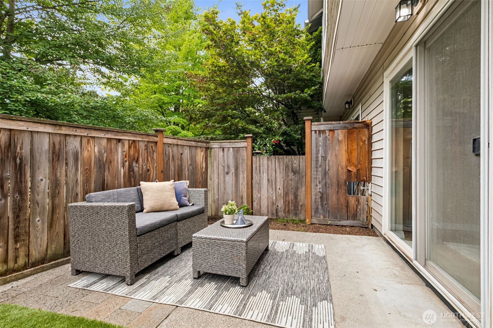 4808 Northeast Sunset Boulevard, Unit A102 Renton, WA 98059 - Photo 15 of 30 a view of a couches and a couches in the patio