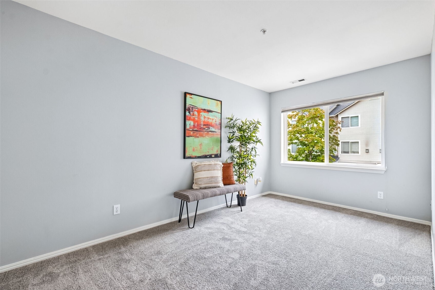 4808 Northeast Sunset Boulevard, Unit A102 Renton, WA 98059 - Photo 23 of 30 a living room with furniture and a window