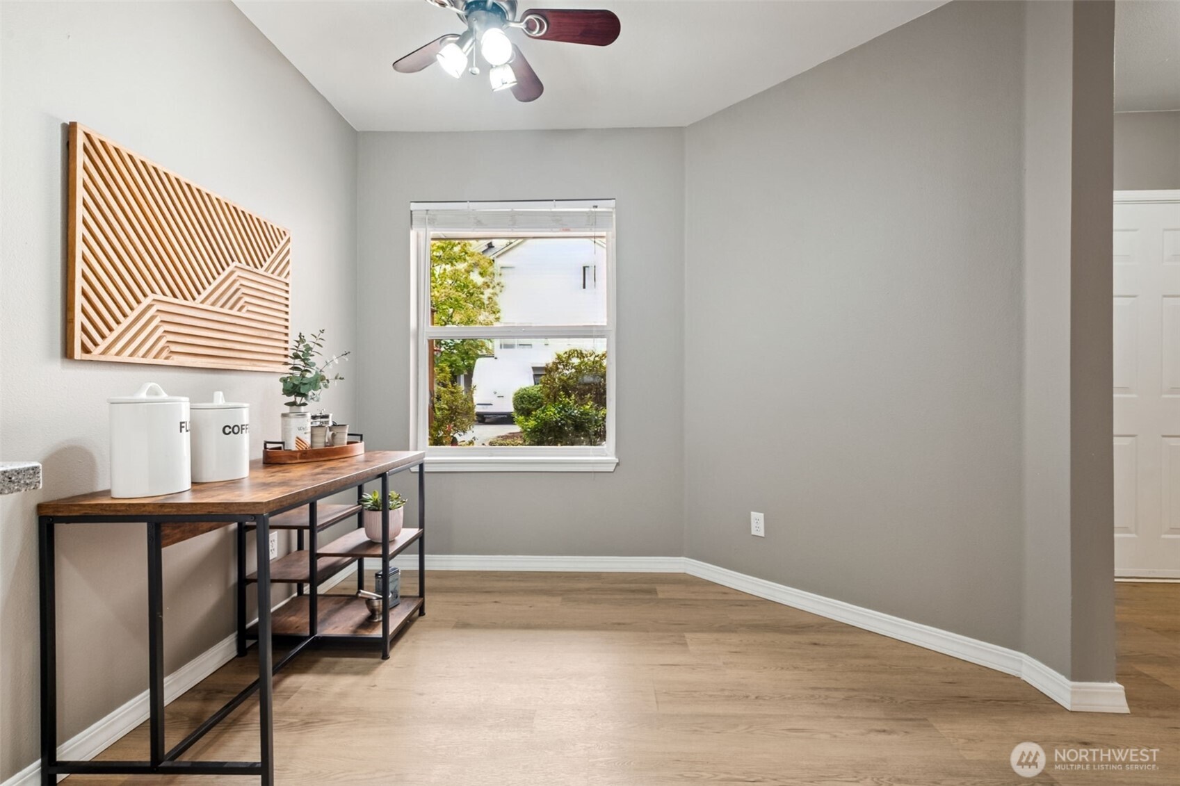 4808 Northeast Sunset Boulevard, Unit A102 Renton, WA 98059 - Photo 5 of 30 a view of a workspace with furniture and a window