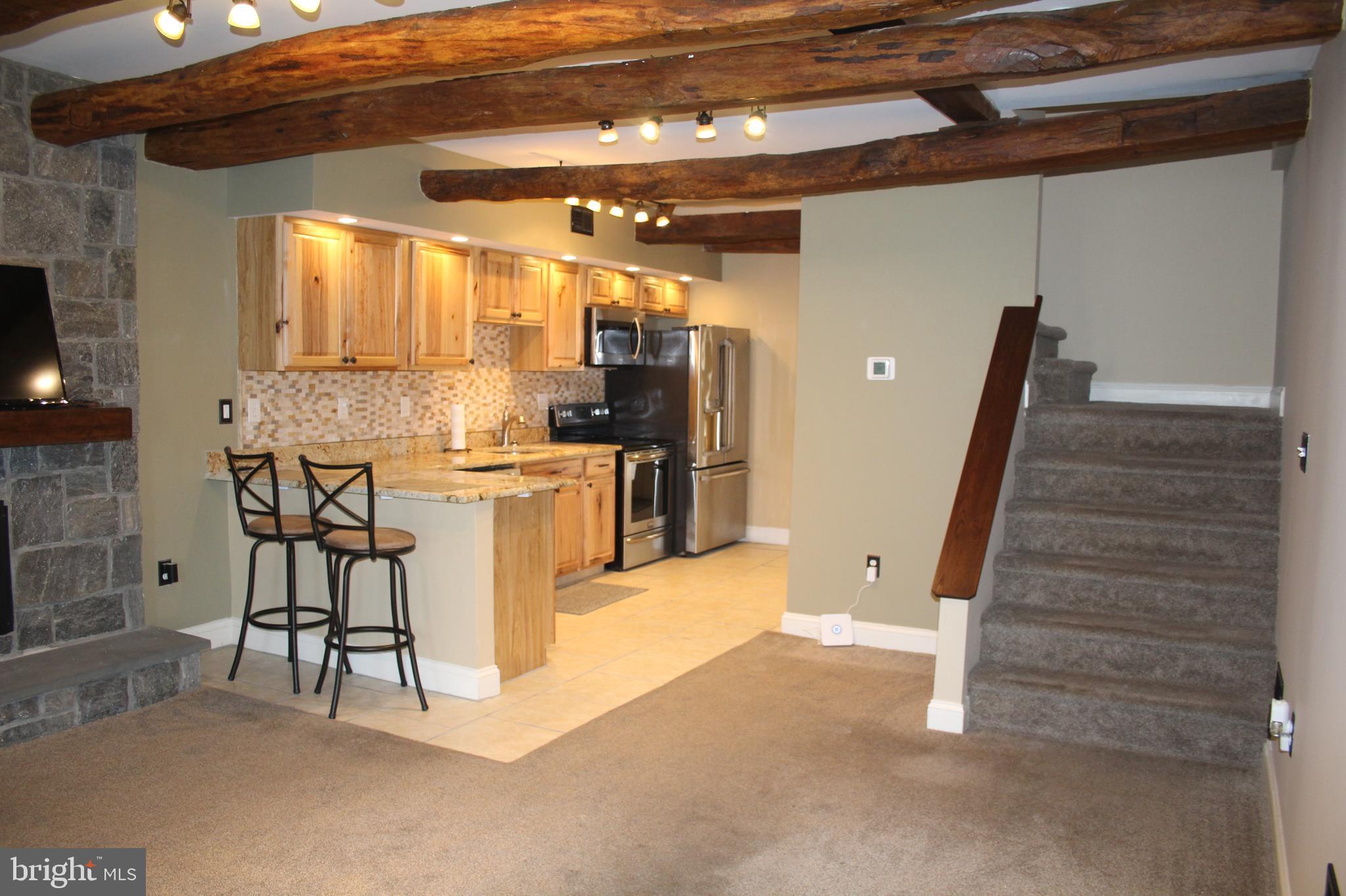 1152 South Valley Forge Road, Unit 1152 Norristown, PA 19403 - Photo 8 of 21 a view of a kitchen with furniture and a kitchen