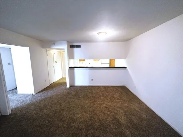 a view of a kitchen with a sink