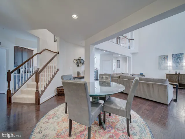 a bedroom with a bed window and couch