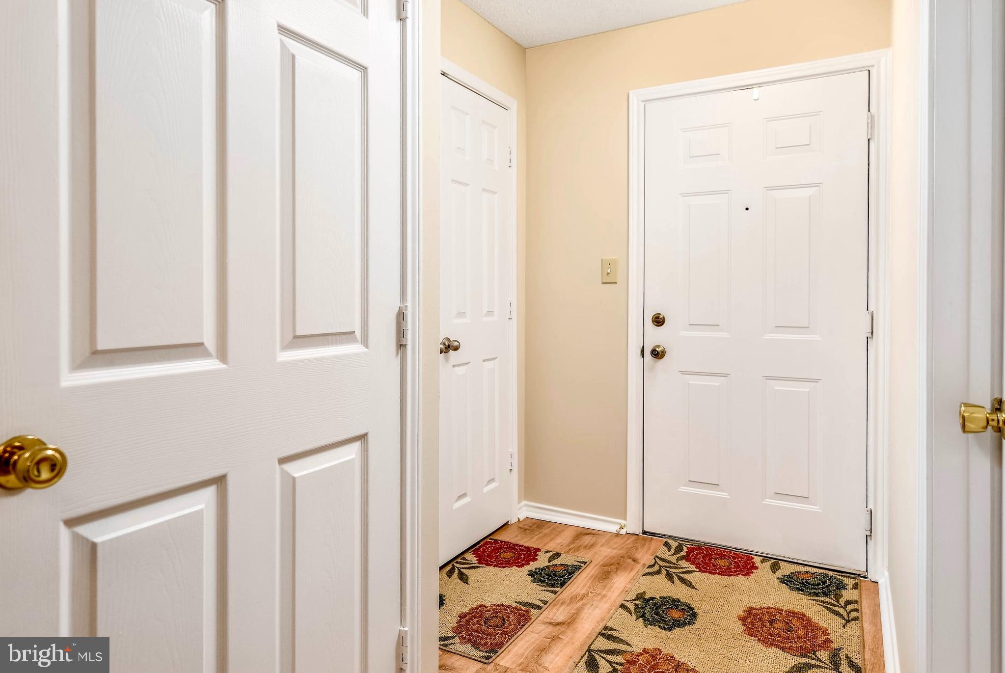 20963 Timber Ridge Terrace, Unit 302 Ashburn, VA 20147 - Photo 17 of 21 Generous foyer with plenty of storage.