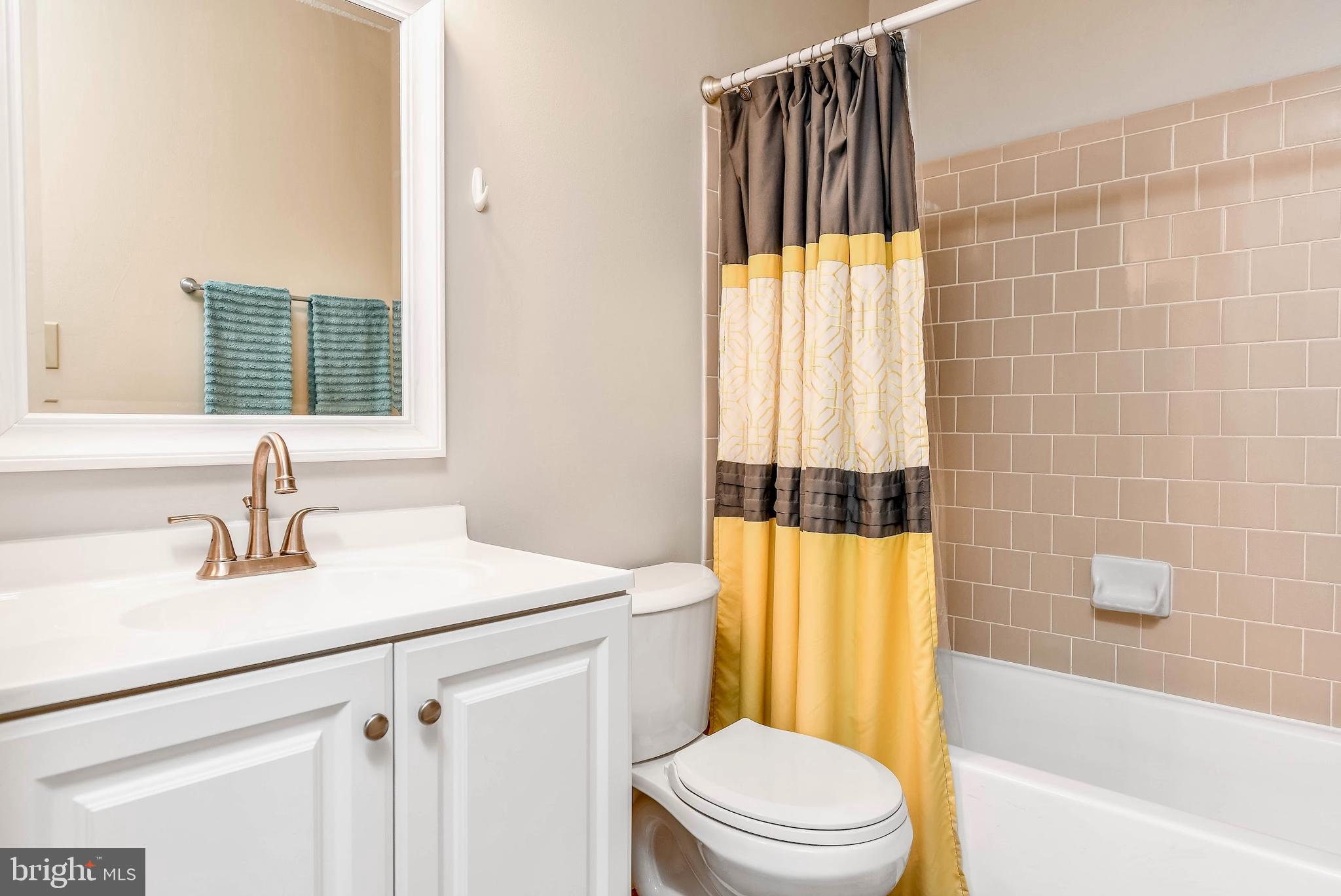 20963 Timber Ridge Terrace, Unit 302 Ashburn, VA 20147 - Photo 9 of 21 Completely updated primary bathroom!