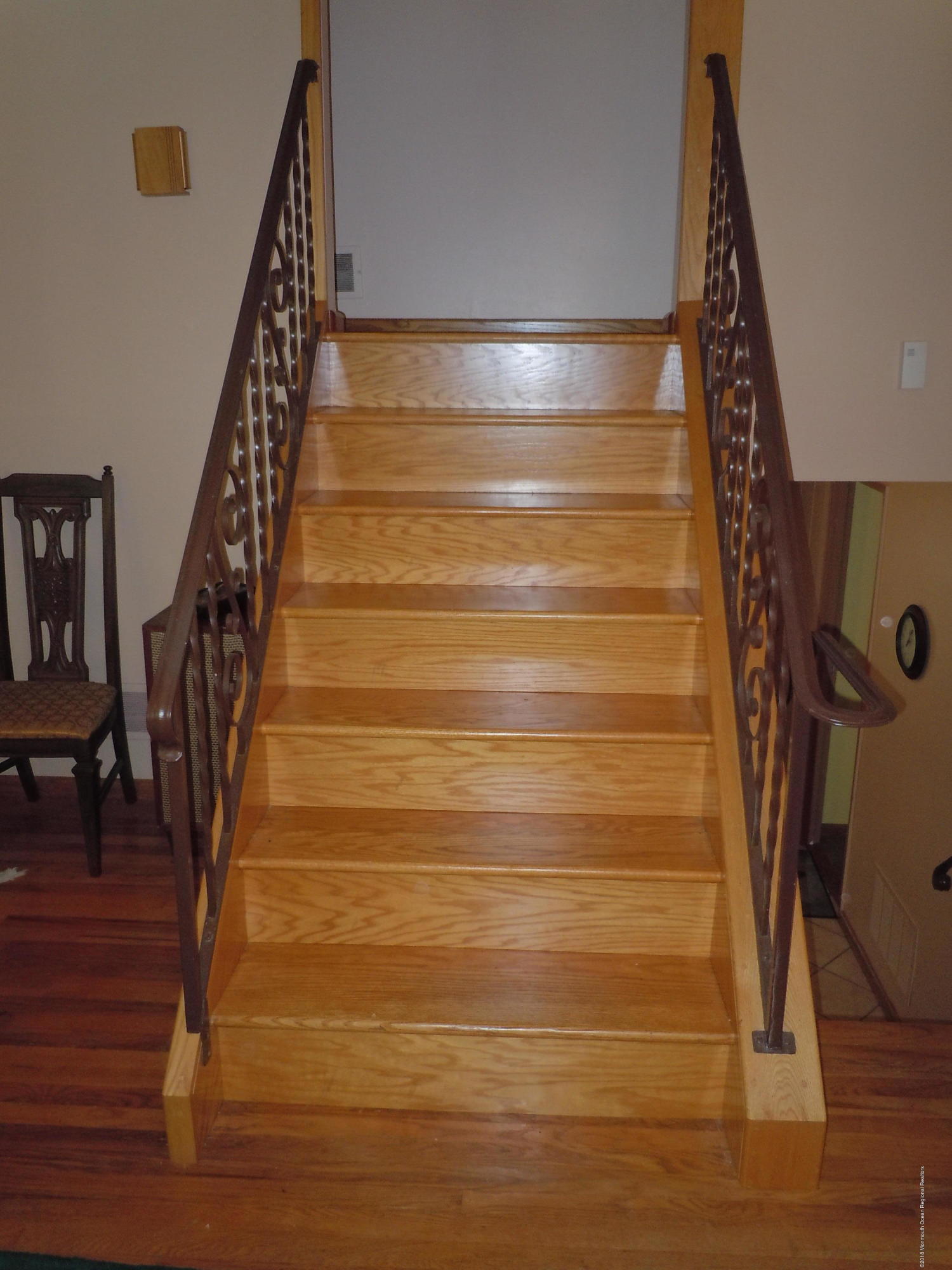 7 Peach Tree Road Oakhurst, NJ 07755 - Photo 16 of 36 a view of entryway with wooden floor