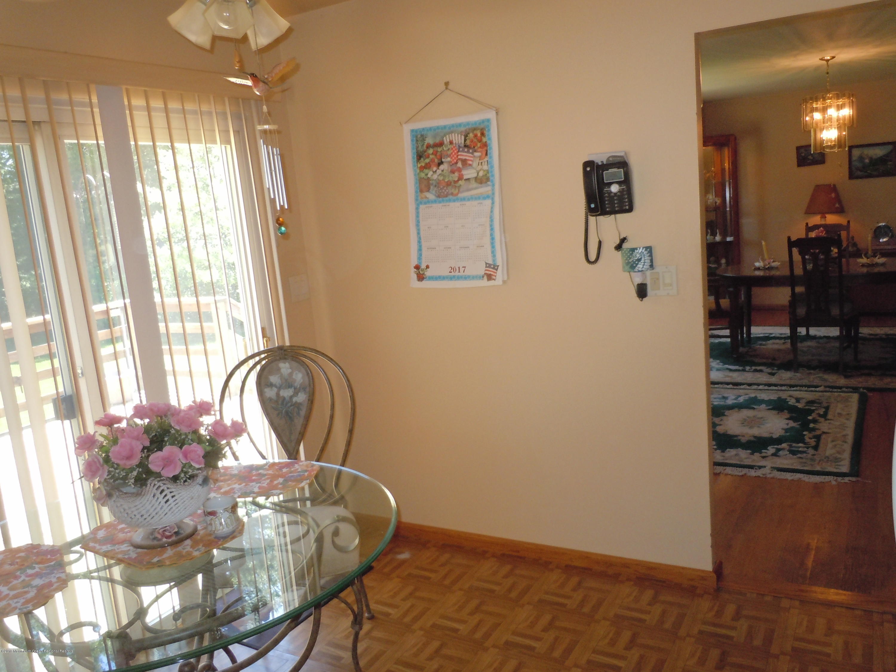 7 Peach Tree Road Oakhurst, NJ 07755 - Photo 26 of 36 a room with furniture and window
