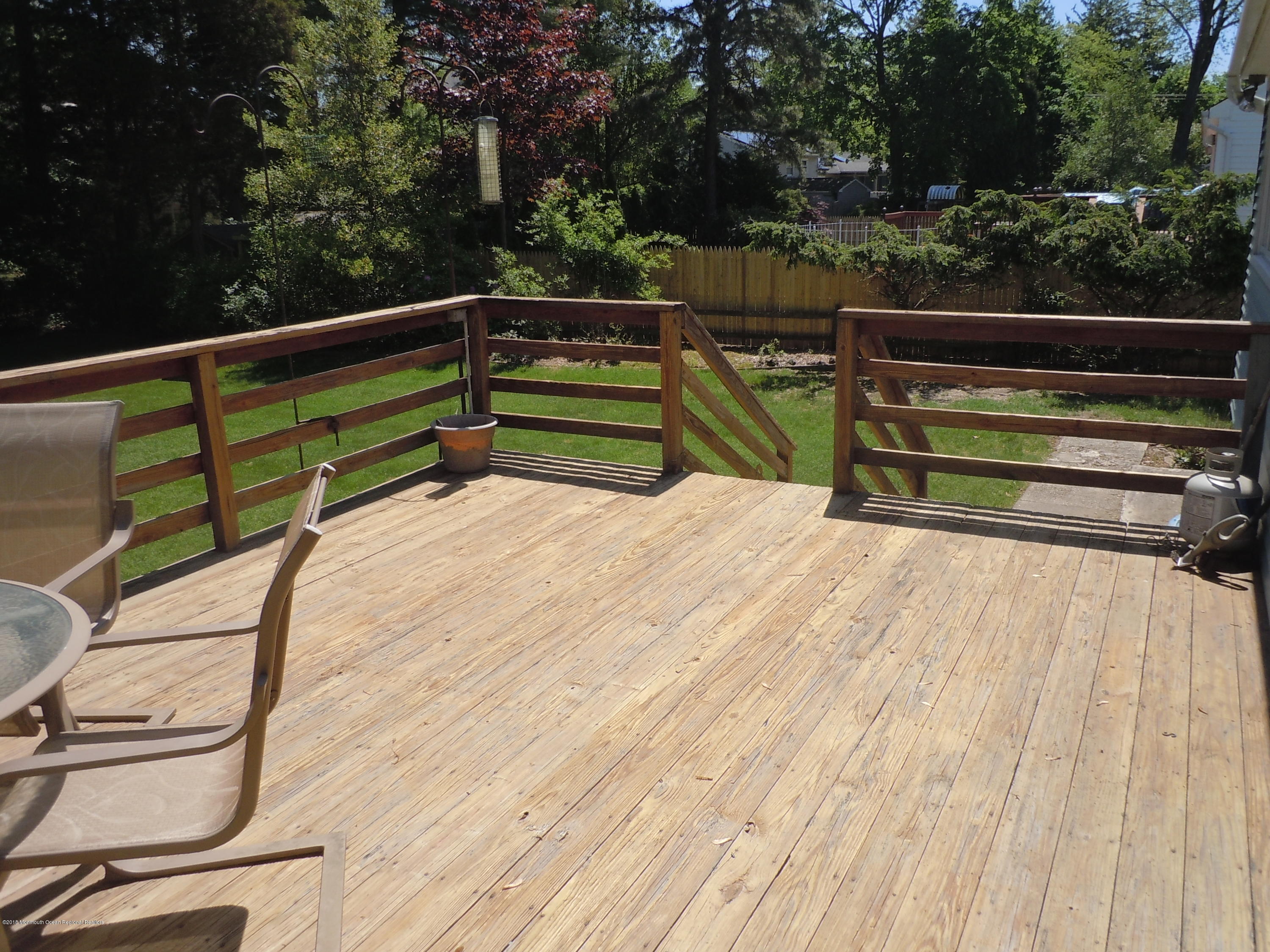 7 Peach Tree Road Oakhurst, NJ 07755 - Photo 28 of 36 a view of outdoor space with seating