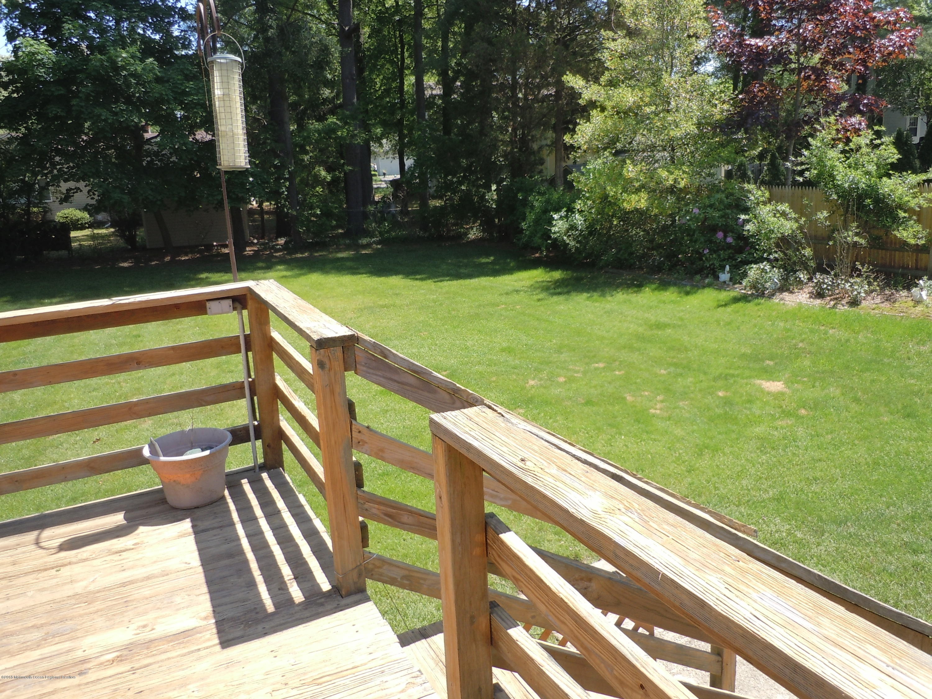 7 Peach Tree Road Oakhurst, NJ 07755 - Photo 31 of 36 a view of building with yard