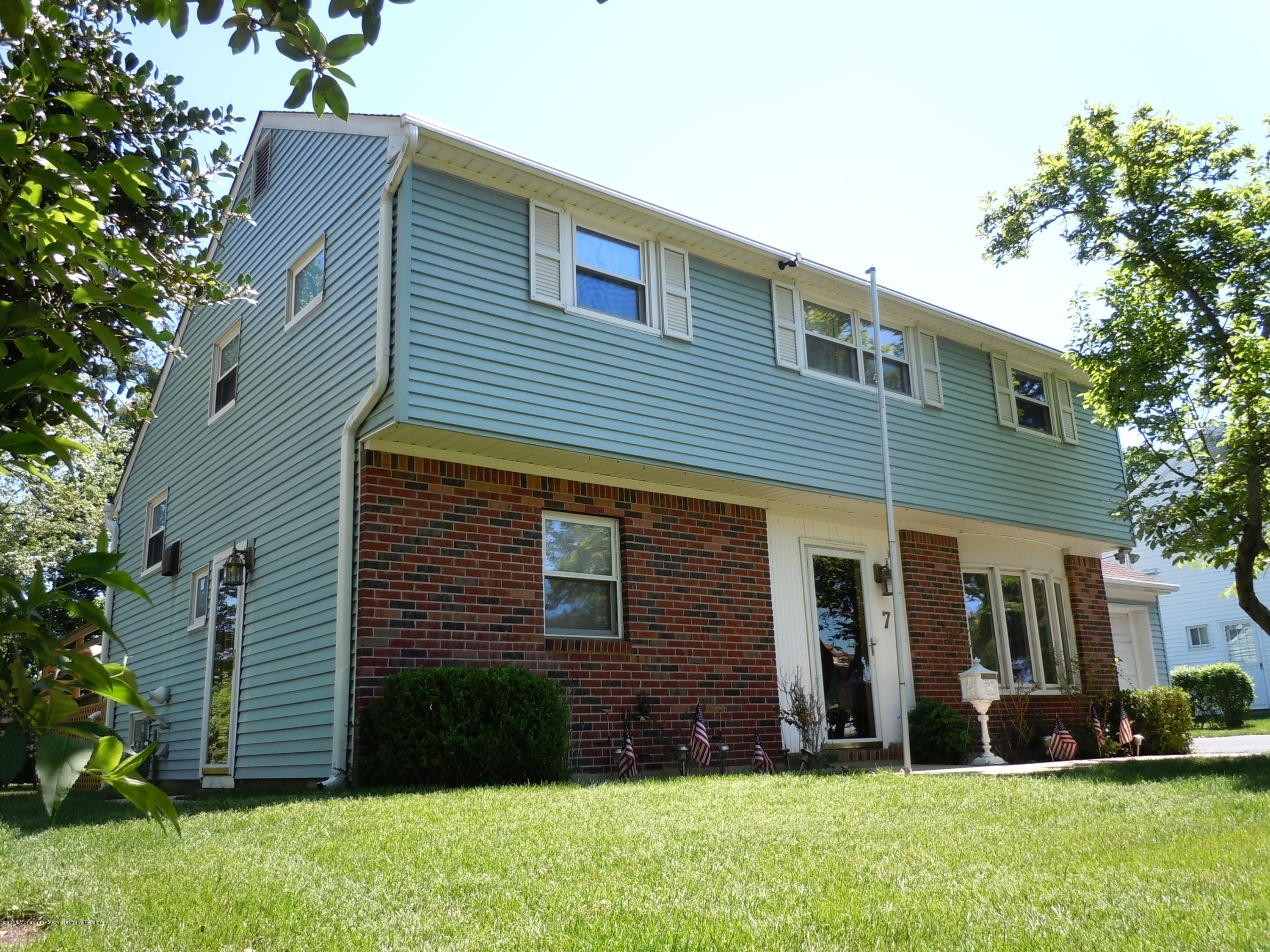 7 Peach Tree Road Oakhurst, NJ 07755 - Photo 35 of 36 a view of a house with a yard