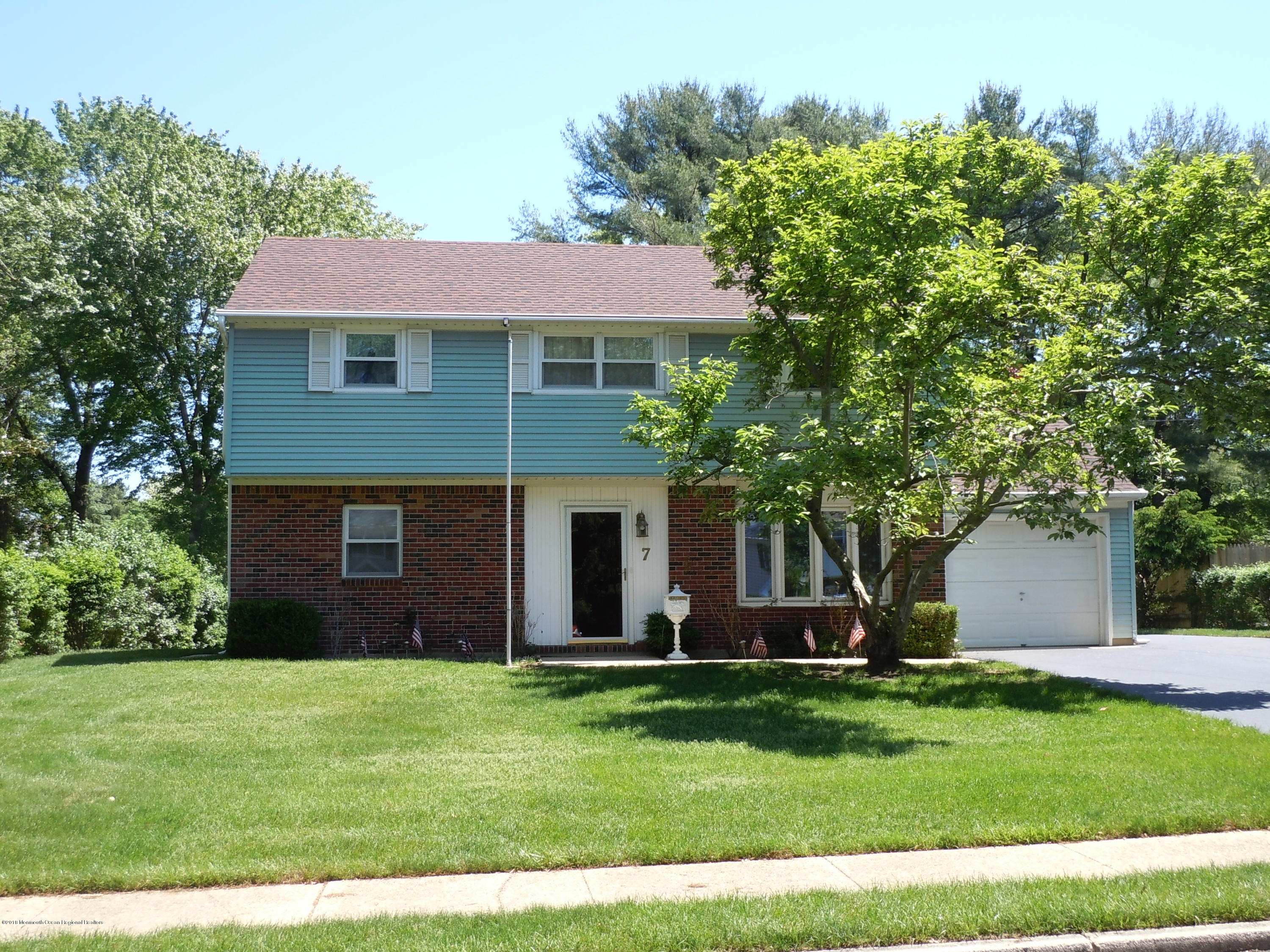 7 Peach Tree Road Oakhurst, NJ 07755 - Photo 36 of 36 a view of a house with a yard