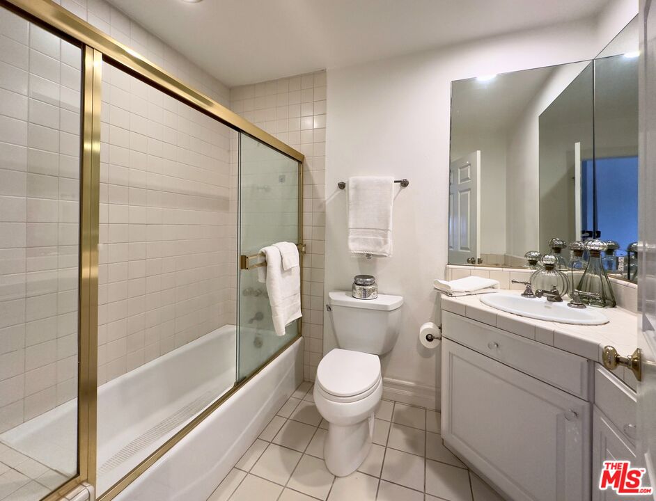 6140 Cavalleri Road, Unit GH Malibu, CA 90265 - Photo 17 of 24 a bathroom with a toilet sink and shower