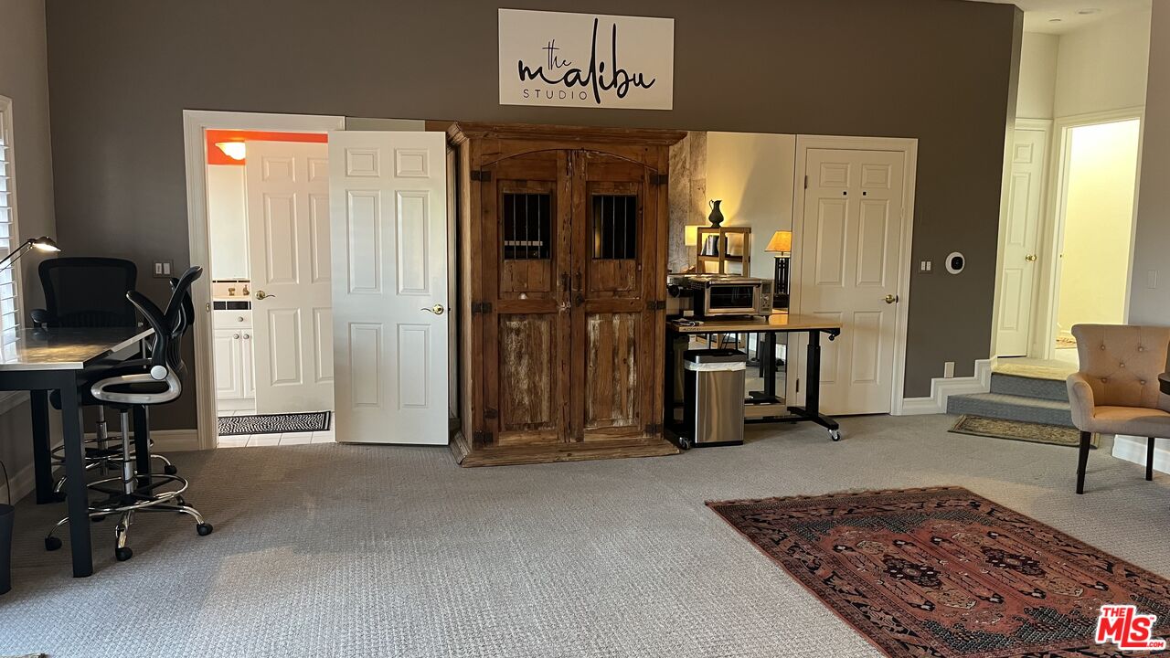 6140 Cavalleri Road, Unit GH Malibu, CA 90265 - Photo 7 of 24 a view of a room with gym equipment